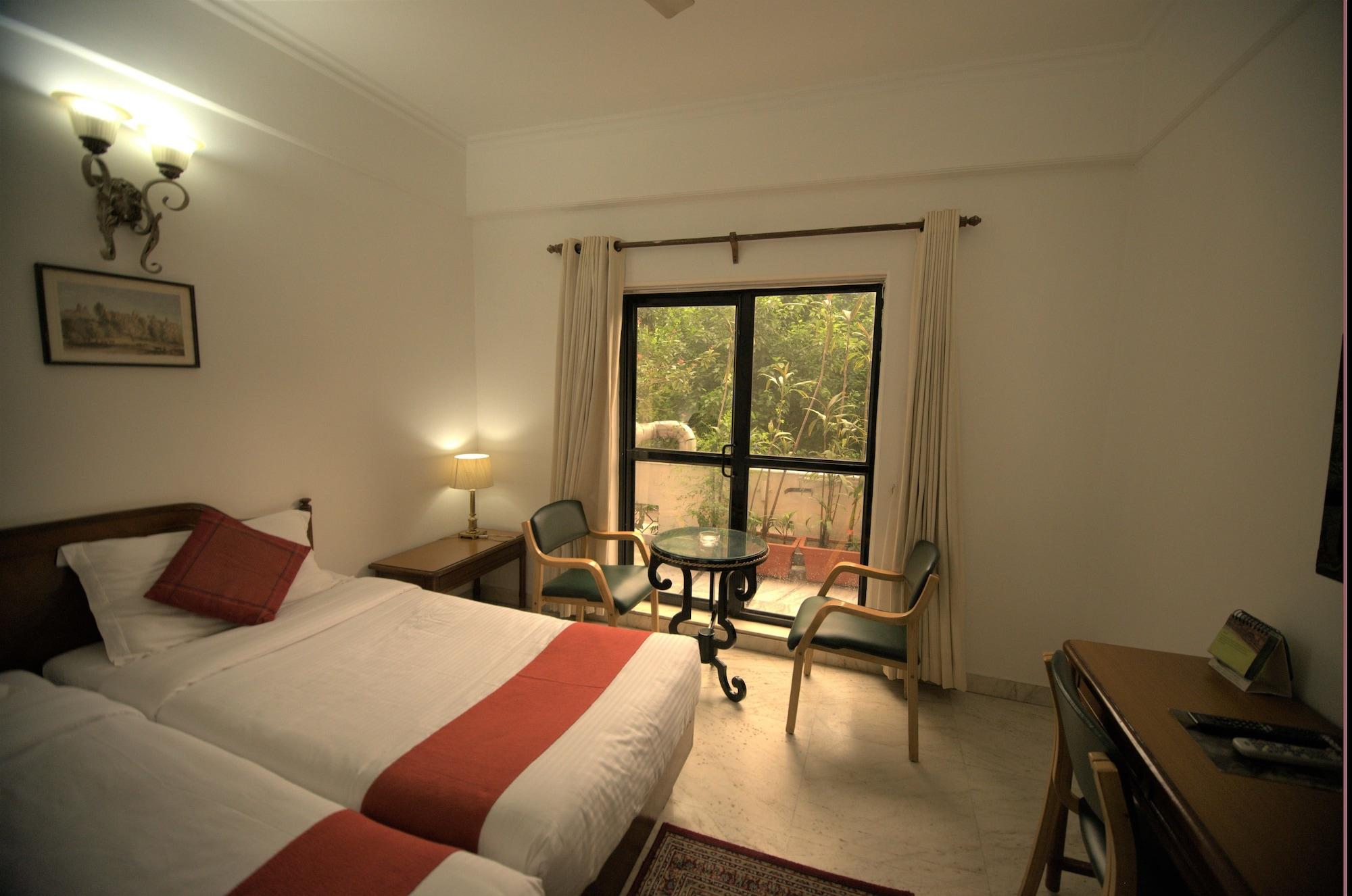 Hotel Palm Greens New Delhi Buitenkant foto