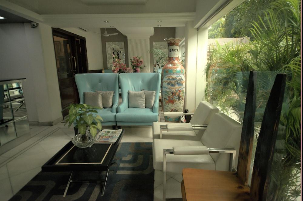 Hotel Palm Greens New Delhi Buitenkant foto