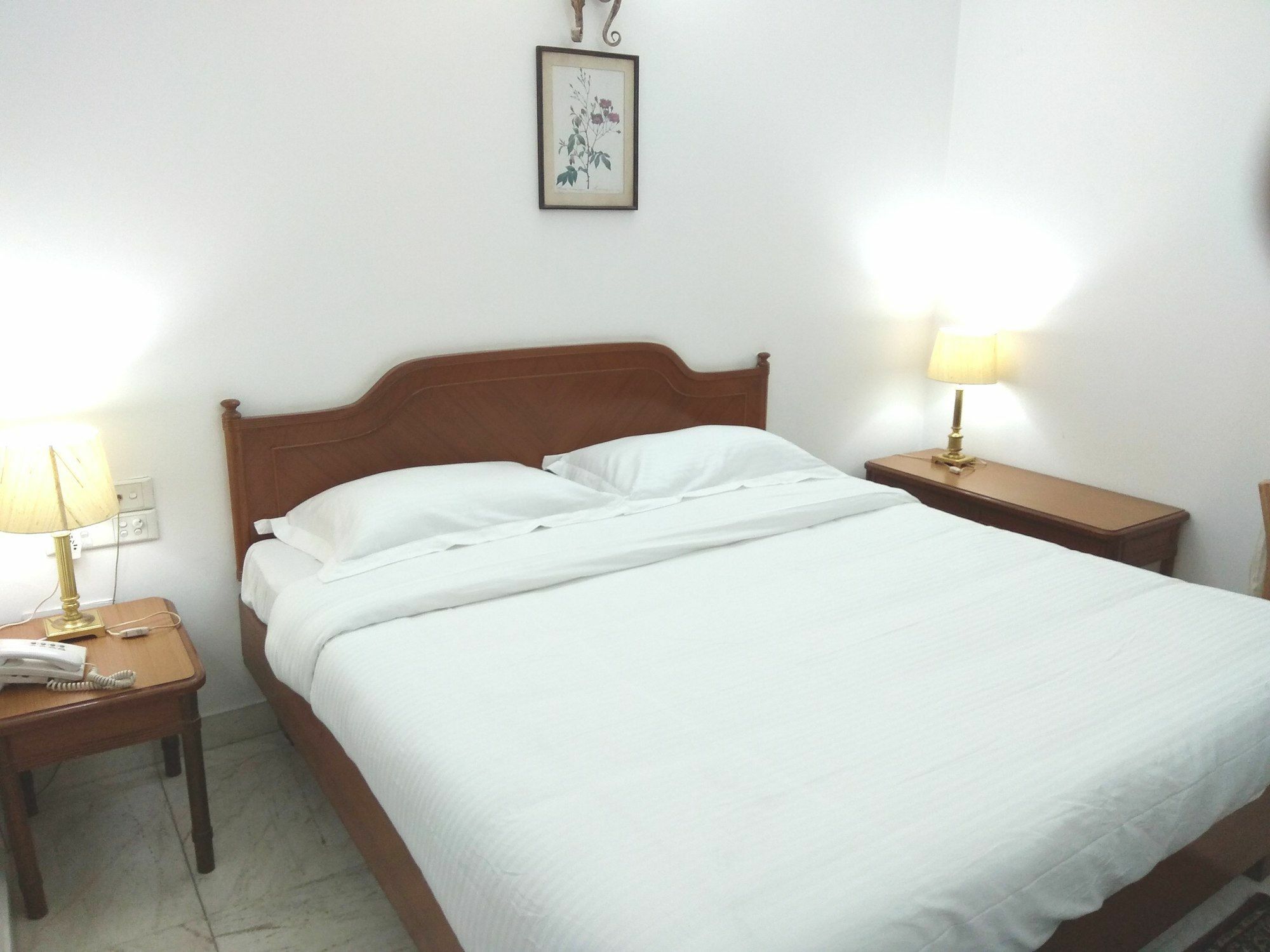 Hotel Palm Greens New Delhi Buitenkant foto